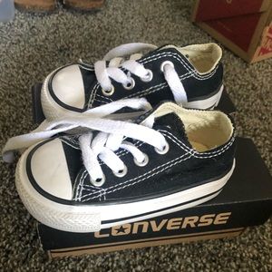 Black low top Chuck Taylor Converse